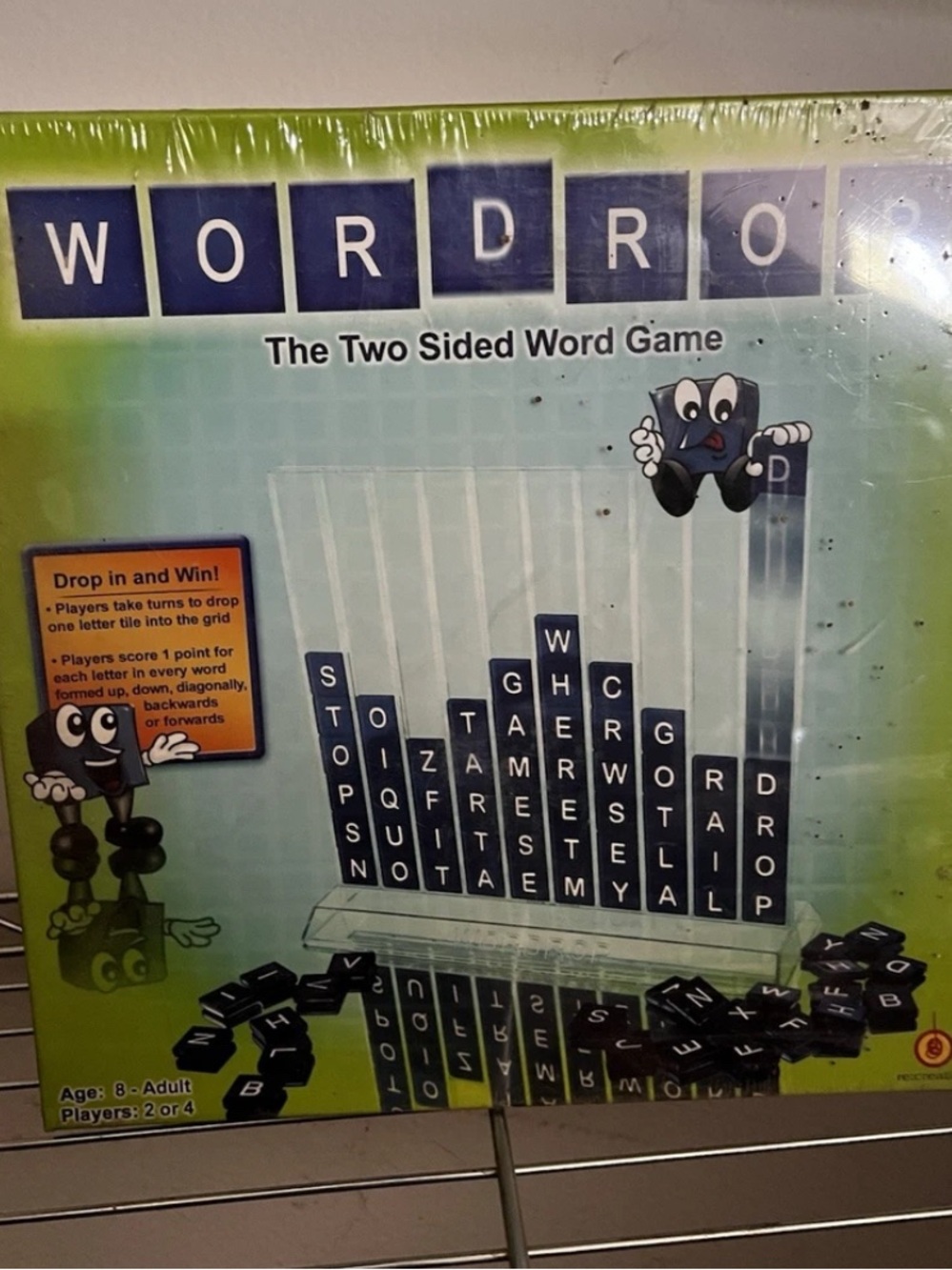 WORDROP Two-Sided Word Game - Letter Drop Game
New in box originally wrapped